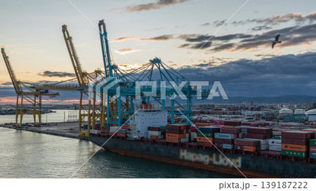 Aerial view of the sea cargo port and container terminal of Barcelona timelapse, Barcelona, Catalonia, Spain. Aerial view of the sea cargo port and container terminal of Barcelona timelapse, Barcelona, Catalonia, Spain. 139187222