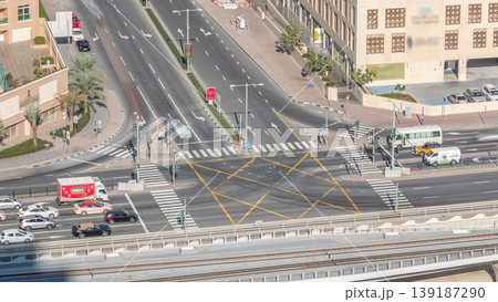 Aerial view of a road intersection in a big city timelapse. 139187290
