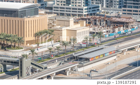 Aerial view of Dubai Tram in Dubai marina timelapse. 139187291