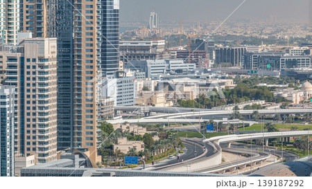 Aerial view of a sheikh zayed road intersection in a big city timelapse. Aerial view of a sheikh zayed road intersection in a big city timelapse. 139187292