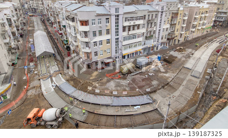 Concrete works for road maintenance construction site with many workers and mixer timelapse 139187325