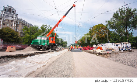 Road construction site with tram tracks repair and maintenance timelapse hyperlapse. Road construction site with tram tracks repair and maintenance timelapse hyperlapse. 139187410