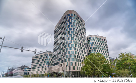 Timelapse of traffic and modern office buildings in the business district on Boulevard Baudouin, Brussels, Belgium. Timelapse of traffic and modern office buildings in the business district on Boulevard Baudouin, Brussels, Belgium. 139187569