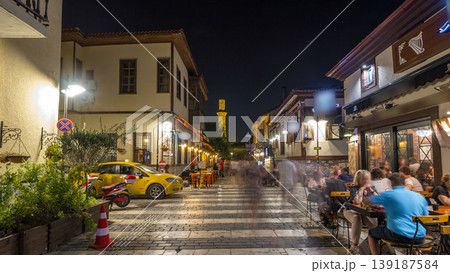 The walk along historic street of Kaleici timelapse hyperlapse with the view on the broken minaret of Kesik Minare Camii mosque in Antalya. The walk along historic street of Kaleici timelapse hyperlapse with the view on the broken minaret of Kesik Minare Camii mosque in Antalya. 139187584