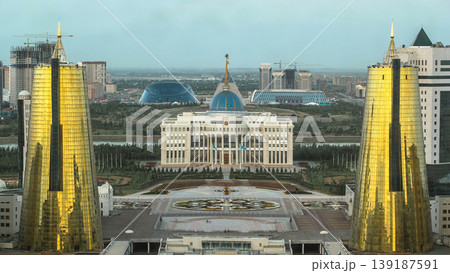 A square in front of Ak Orda with Altyn Orda business center in the foreground timelapse. Nur-Sultan city, Kazakhstan A square in front of Ak Orda with Altyn Orda business center in the foreground timelapse. Nur-Sultan city, Kazakhstan 139187591