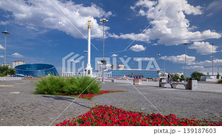 Stele monument Kazakh Eli with bird Samruk and Palace of Independence timelapse hyperlapse. 139187603