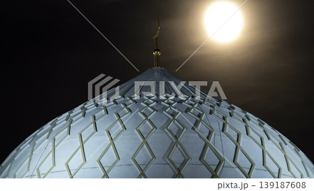 Dome of The Hazrat Sultan Mosque in Astana timelapse at night with full moon, Kazakhstan Dome of The Hazrat Sultan Mosque in Astana timelapse at night with full moon, Kazakhstan 139187608