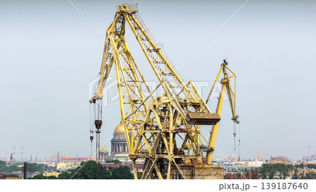 Working yellow cranes at shipyard aerial timelapse Working yellow cranes at shipyard aerial timelapse 139187640