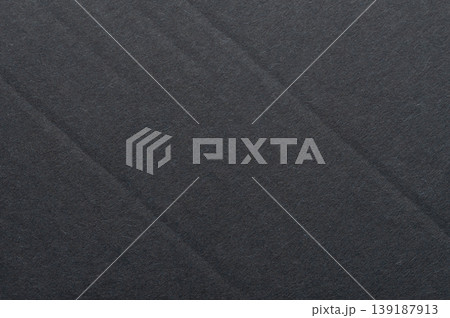 Black paper surface with crease line Black paper surface with crease line 139187913