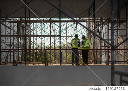 Construction collaboration between engineers urban site image capture industrial environment elevated viewpoint project planning Construction collaboration between engineers urban site image capture industrial environment elevated viewpoint project planning 139187958
