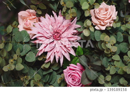 Stylish interior bouquet in pink tones from garden flowers and eucalyptus Stylish interior bouquet in pink tones from garden flowers and eucalyptus 139189158