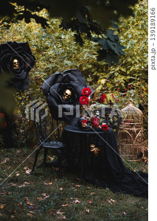 Gothic Outdoor Tea Party with Black Roses and Skull Gothic Outdoor Tea Party with Black Roses and Skull 139189166