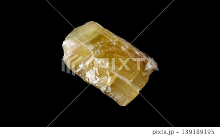 Golden Gemstone Texture: Yellow Calcite Isolated on Black Background 139189195
