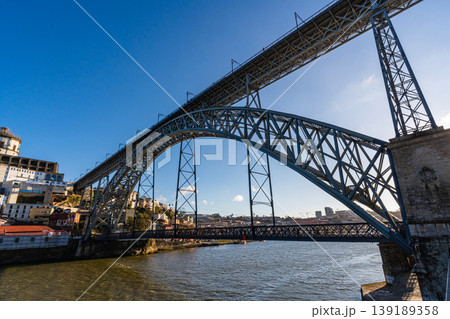 Dom Luis I bridge over Douro river Porto Portugal low angle view Dom Luis I bridge over Douro river Porto Portugal low angle view 139189358