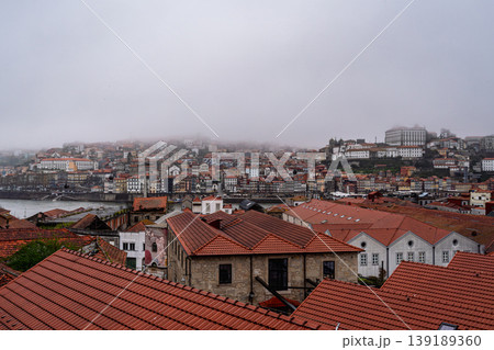 Porto cityscape with Douro river and fog Portugal Porto cityscape with Douro river and fog Portugal 139189360