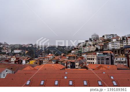 Porto cityscape with Douro river and fog Portugal Porto cityscape with Douro river and fog Portugal 139189361