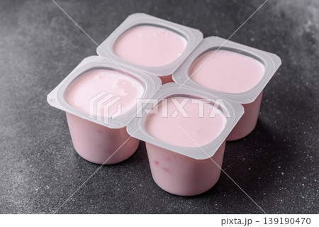 Milky liquid drinking yogurt, a useful food for healthy digestion. Drinking yogurt Milky liquid drinking yogurt, a useful food for healthy digestion. Drinking yogurt 139190470