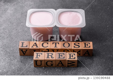 Liquid lactose free yogurt, a useful food for digestive health. Lactose free yogurt Liquid lactose free yogurt, a useful food for digestive health. Lactose free yogurt 139190488