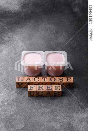 Liquid lactose free yogurt, a useful food for digestive health. Lactose free yogurt Liquid lactose free yogurt, a useful food for digestive health. Lactose free yogurt 139190492