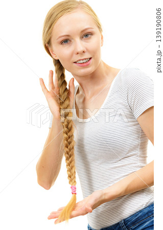 Blonde young woman with braid hair Blonde young woman with braid hair 139190806