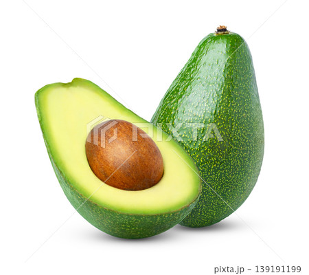 Isolated avocado. Fresh green avocado fruit and cut in half isolated on white background. 139191199