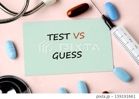 Light green note displays test versus guess text Light green note displays test versus guess text 139191661