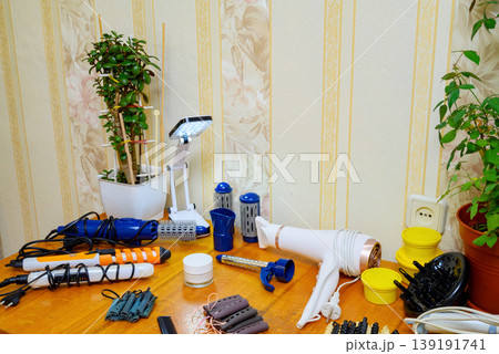 hair styling space organization using modern equipment and lighting on a desk hair styling space organization using modern equipment and lighting on a desk 139191741
