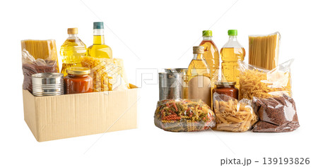 Foodstuff for donation, storage and delivery. Various food, pasta, cooking oil and canned food in cardboard box. 139193826