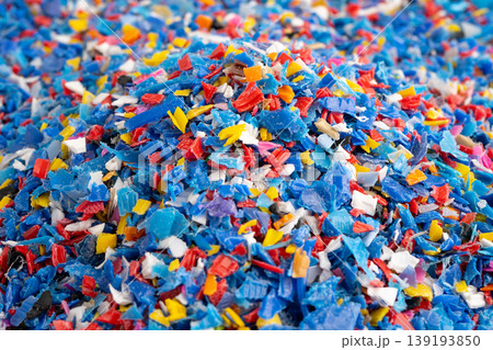 Plastic colorful pieces recycling shredded for industrial use. Plastic colorful pieces recycling shredded for industrial use. 139193850