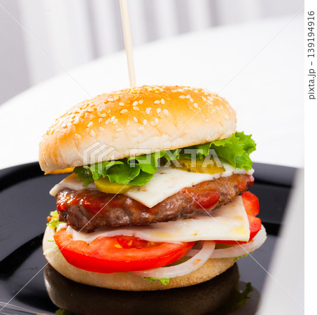 Hamburger is tasty dish on the plate Hamburger is tasty dish on the plate 139194916