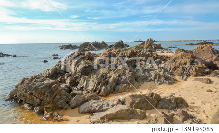 Close Up Sharp Jagged Rocks on Tropical Sandy Beach Close Up Sharp Jagged Rocks on Tropical Sandy Beach 139195085