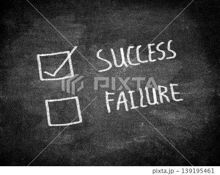 Hand drawing chalk bulb and word success,failure on blackboard. 139195461