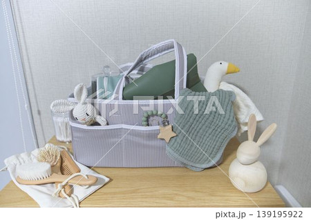 Baby care organizing caddy with essential newborn products Baby care organizing caddy with essential newborn products 139195922