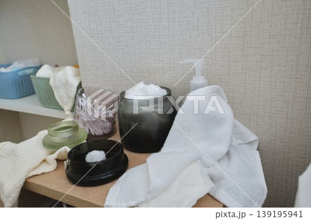 Bathroom shelf with skincare products and hygiene items 139195941