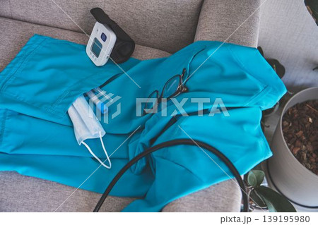Medical scrubs with equipment for healthcare profession Medical scrubs with equipment for healthcare profession 139195980
