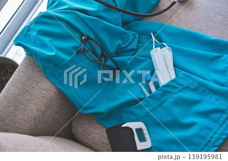Healthcare worker uniform and medical essentials for duty Healthcare worker uniform and medical essentials for duty 139195981