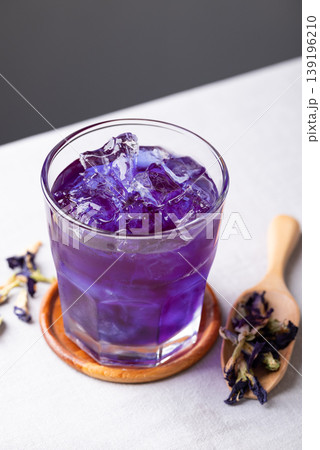 Iced butterfly pea tea in glass, a healthy herbal drink Iced butterfly pea tea in glass, a healthy herbal drink 139196210