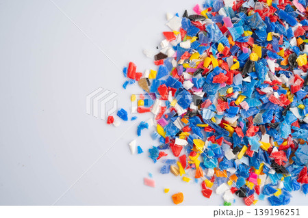 Plastic colorful pieces recycling shredded for industrial use. Plastic colorful pieces recycling shredded for industrial use. 139196251