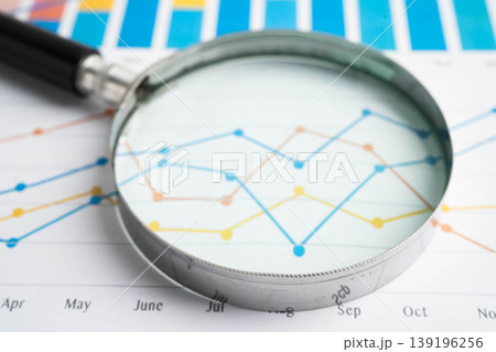 Magnifying glass on charts graphs paper. Financial development, Banking Account, Statistic, Investment Analytic research data economy. Magnifying glass on charts graphs paper. Financial development, Banking Account, Statistic, Investment Analytic research data economy. 139196256