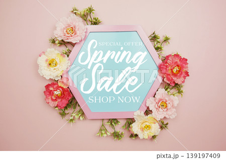 Spring Sale text on hexagon background with beautiful flowers blooming Spring Sale text on hexagon background with beautiful flowers blooming 139197409