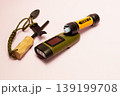 Essential survival gear with water filter and flint 139199708