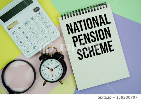 NPS National Pension Scheme text with calculator, alarm clock and magnifying glass 139200707