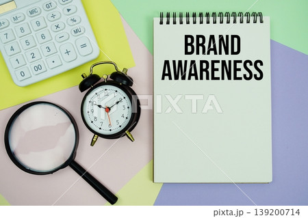 Brand Awareness text with calculator, alarm clock and magnifying glass 139200714