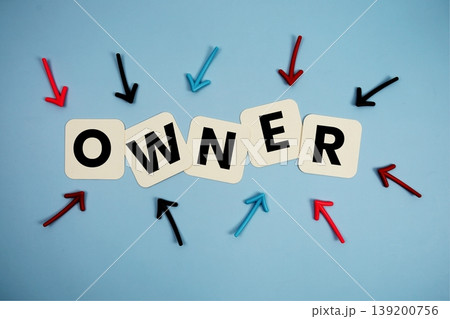 word "OWNER" on cards with colorful arrows pointing toward it, highlighting the concept of management word "OWNER" on cards with colorful arrows pointing toward it, highlighting the concept of management 139200756