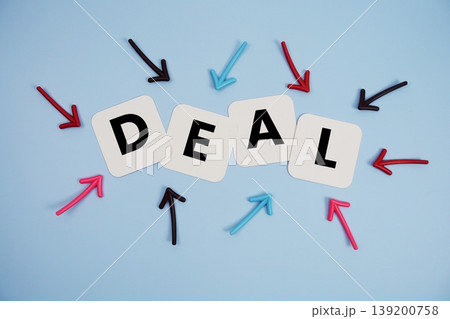 word "DEAL" on cards with colorful arrows pointing toward it, highlighting the concept of agreement 139200758
