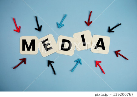 word "MEDIA" on cards with colorful arrows pointing toward it, highlighting the concept of content word "MEDIA" on cards with colorful arrows pointing toward it, highlighting the concept of content 139200767