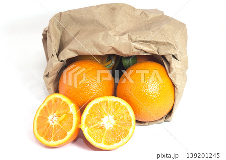 yellow meal oranges with recyclable paper bag 139201245