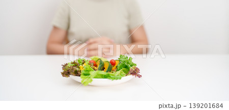 happy smiling woman with fresh organic vegetables plate. healthy nutrition, weight loss, clean eating, Healthy food eating, Vegan, Wellness, Green dieting and Healthy lifestyle happy smiling woman with fresh organic vegetables plate. healthy nutrition, weight loss, clean eating, Healthy food eating, Vegan, Wellness, Green dieting and Healthy lifestyle 139201684