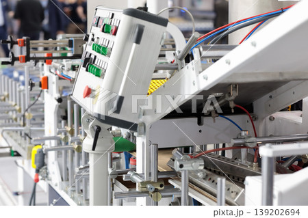 automated production line with control console automated production line with control console 139202694
