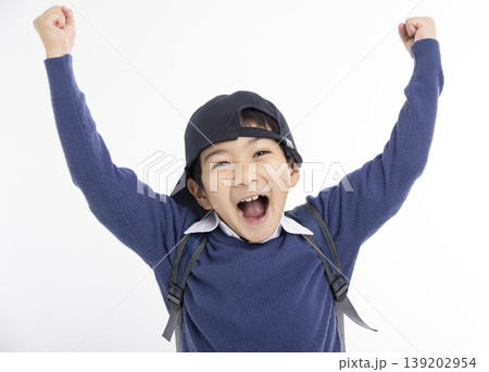Excited Little boy wearing baseball cap isolated on white Excited Little boy wearing baseball cap isolated on white 139202954